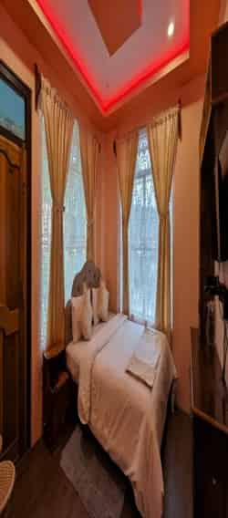 Room interior at Umtyngar Riverside Resort