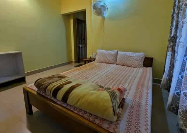 Room interior at Mawlynnong Guest Inn