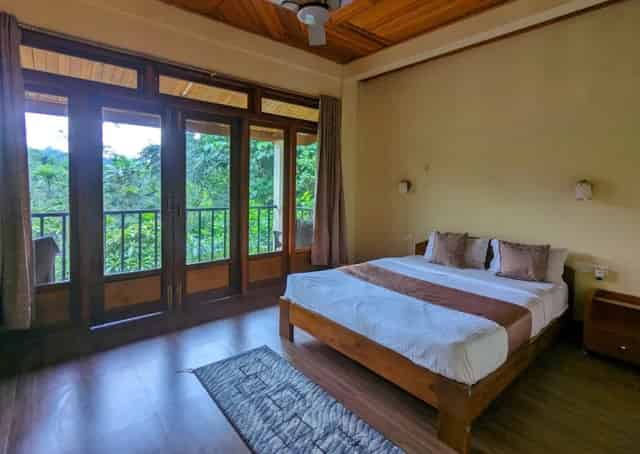 Room interior at Mawlynnong Guest Inn