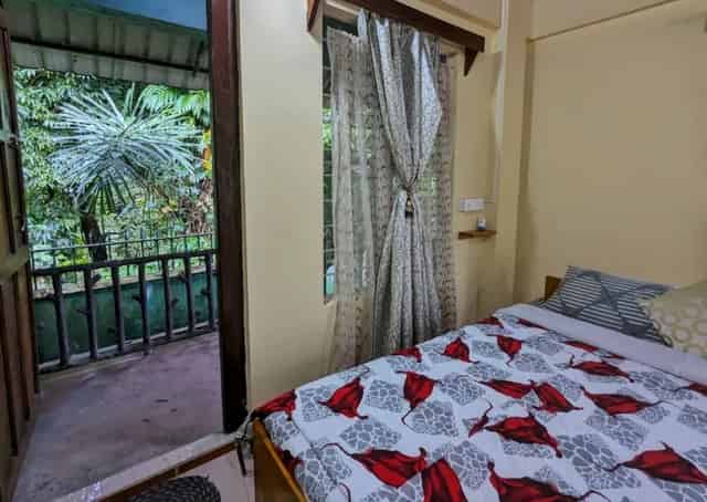 Room interior at Mawlynnong Guest Inn