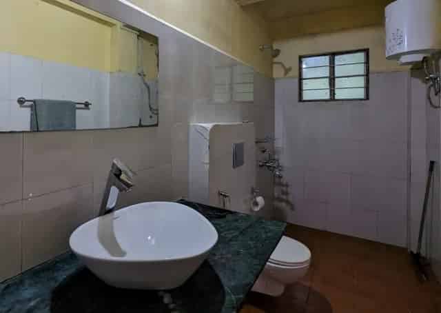 Washroom at Mawlynnong Guest Inn