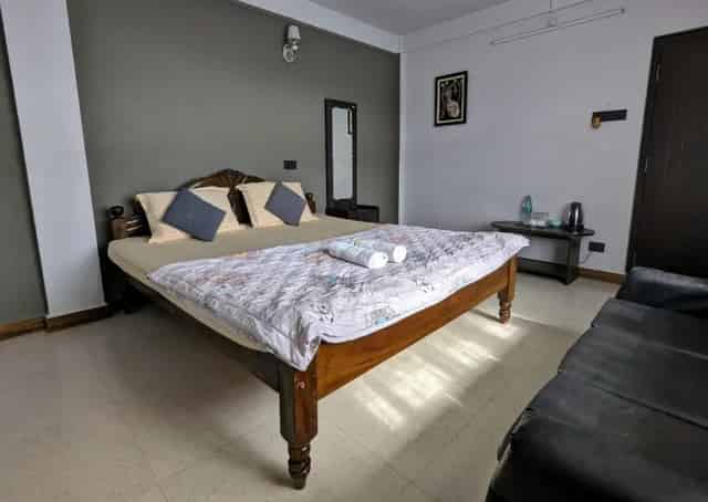 Room interior at Mawlynnong Guest Inn