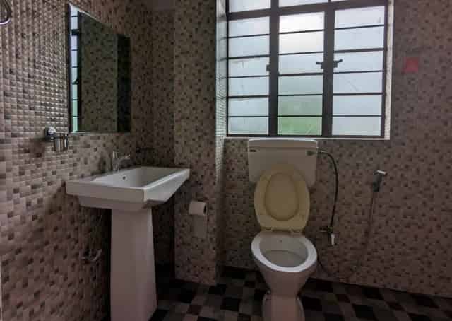 Washroom at Mawlynnong Guest Inn