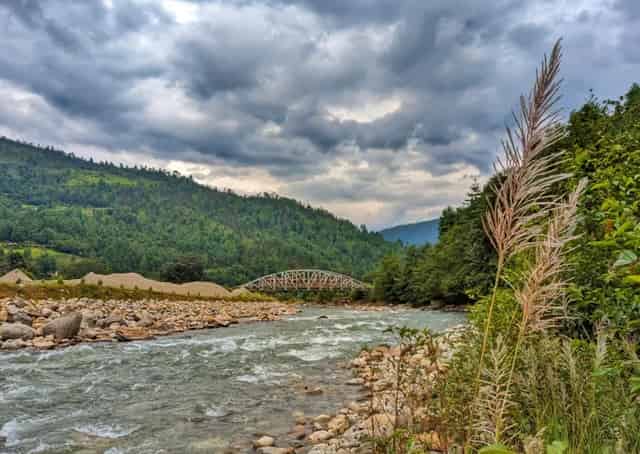 River view with mountains beside Sangti Guest Inn
