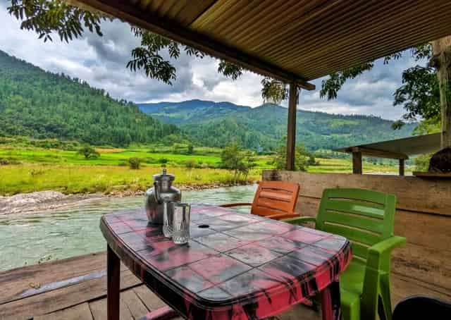River view with mountains beside Sangti Guest Inn