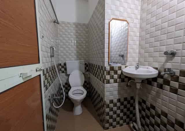 Washroom at Daringbadi Guest Inn