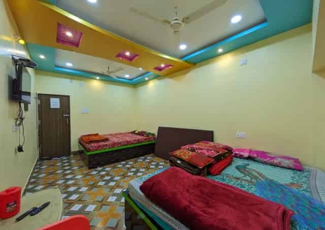 Friends room at Daringbadi Guest Inn