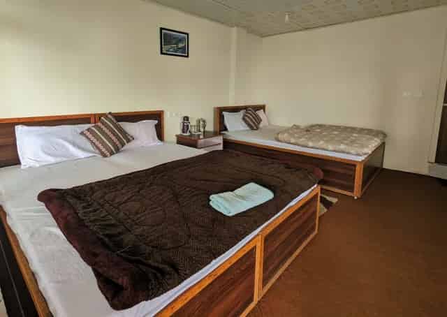 Four Shared Room Interior at Zuluk Homestay