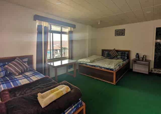 Tripple Shared Room Interior at Zuluk Homestay