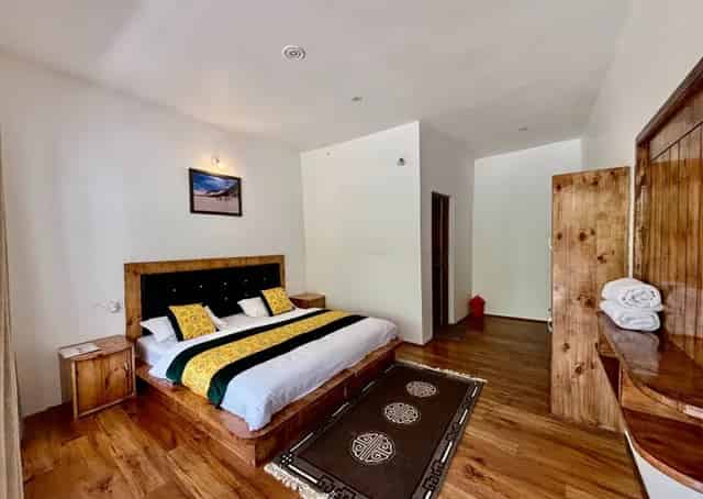 Luxury room with balcony interior at Diskit Retreat