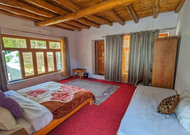 Triple Bedroom Interior at Aryan Valley Retreat