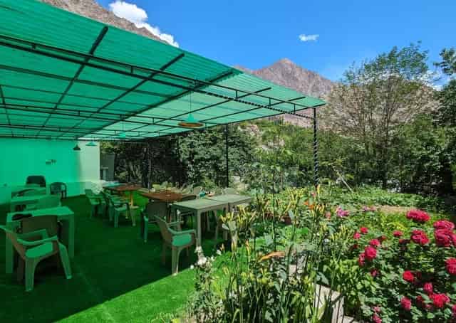 Outdoor dining area at Aryan Valley Retreat Garden