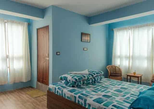 Double bedded View Room interior at Darjeeling Homestay