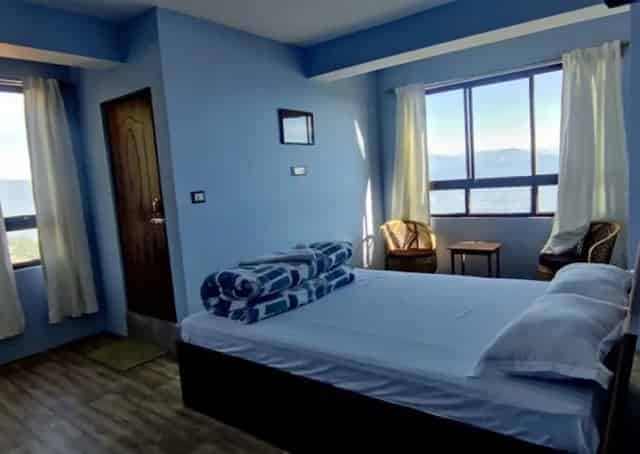 Double bedded View Room interior at Darjeeling Homestay