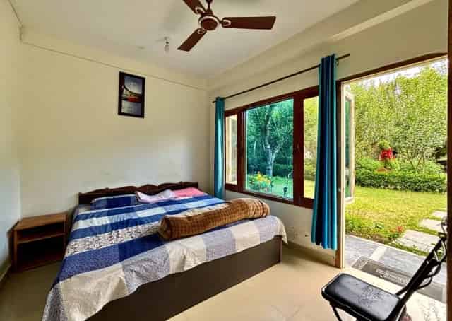 Cozy room interior at Kullu Homestay