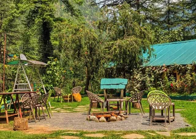Seating area and campfire zone at Kasol Glamping Ground
