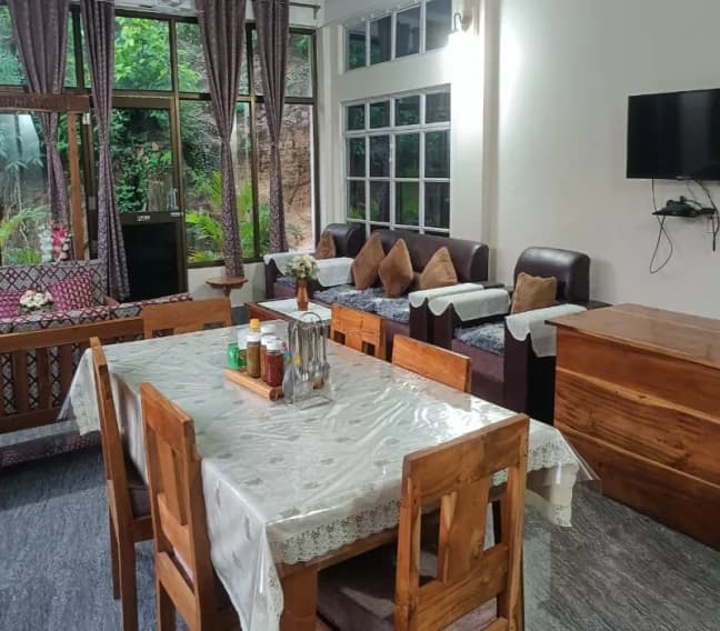 Baghmara Homestay Seating Area